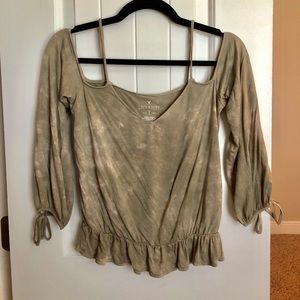 Light wash green long sleeve top